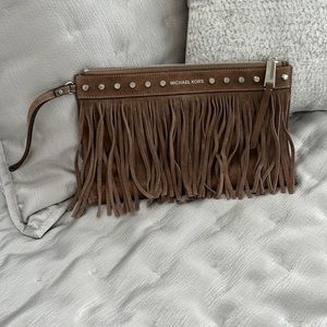 Michael Kors Fringed Suede Leather clutch purse with silver accents.